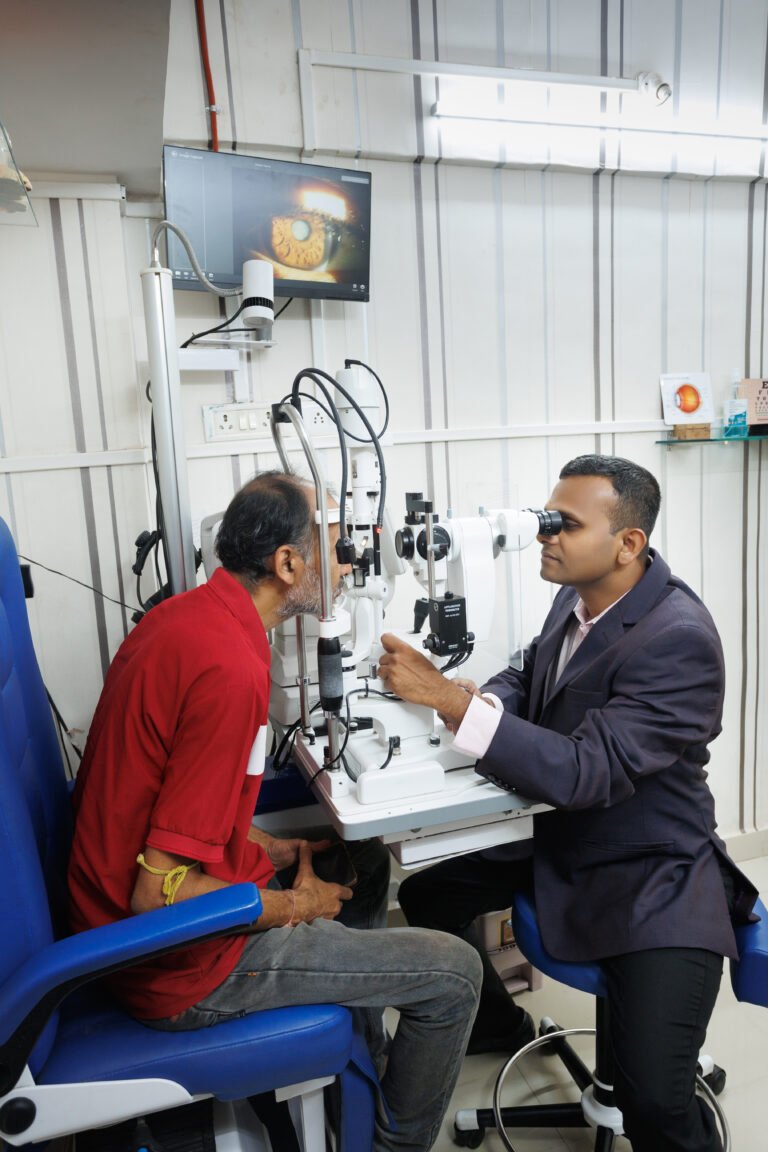 LEH Dr. Pradeep Koli in OPD on slit lamp checking patients